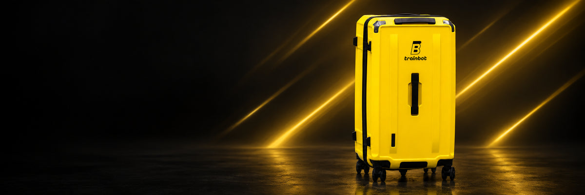 Yellow TrainBot wheeled transport case against a dark background